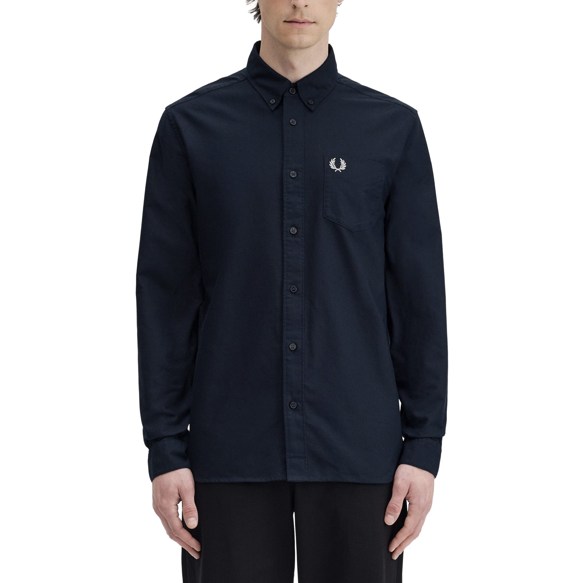 Front of a Navy Fred Perry shirt on a white background
