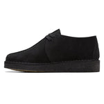 Black suede shoe on a white background