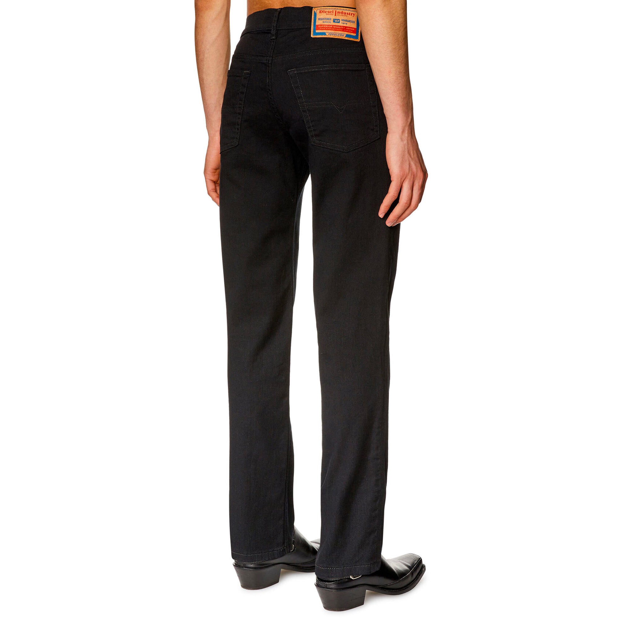 Rear view of Diesel D-Finitive 69YP Tapered Fit Jeans in Black